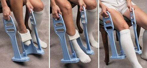 Special device for putting on compression garments